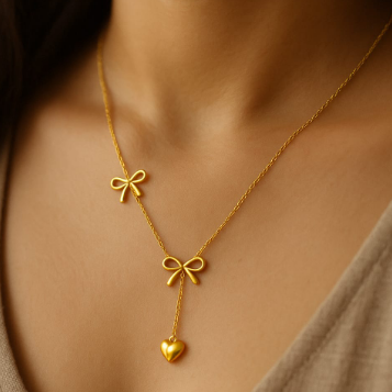 Bow and heart neck piece